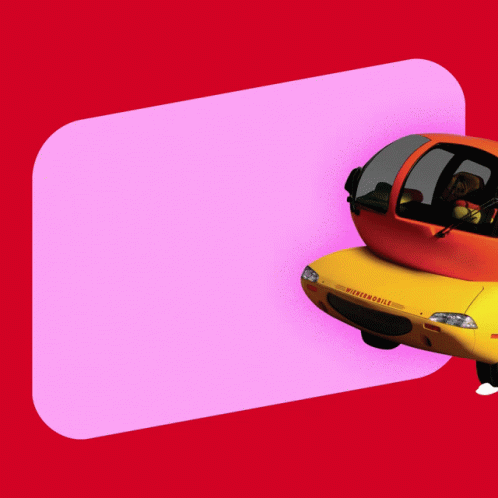 A Yellow And Orange Car With The Word Mitchell On It GIF