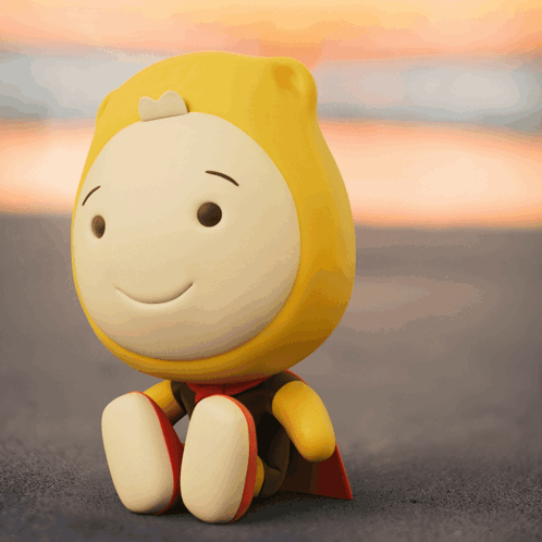 A Yellow And White Cartoon Character With A Cape On GIF
