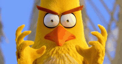 A Yellow Angry Bird With A Red Beak Making A Funny Face GIF