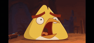 A Yellow Angry Bird With A Surprised Expression On Its Face GIF