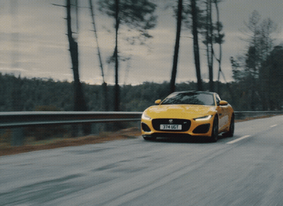 A Yellow Car With The License Plate 374 Ugt GIF
