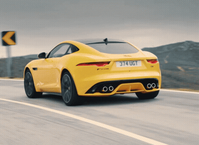 A Yellow Car With The License Plate 374 Ugt GIF