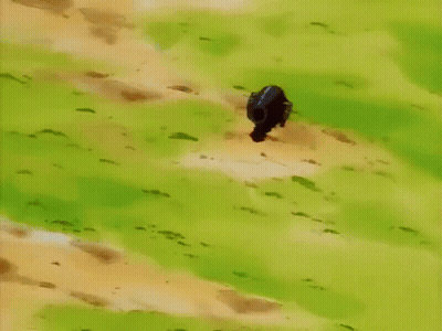 A Yellow Cartoon Character With Red Cheeks Is Laying On The Ground . GIF