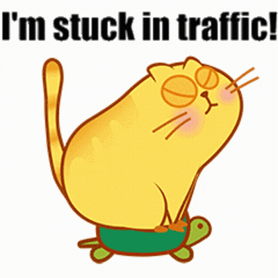 A Yellow Cat Is Stuck On A Green Turtle With The Words " I 'M Stuck In Traffic " Above It GIF