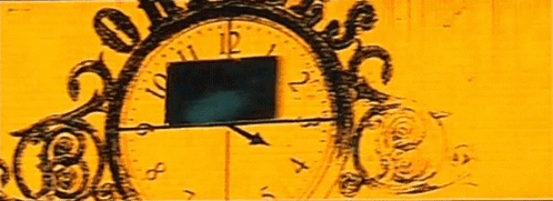 A Yellow Clock With The Hands On The Numbers 12 And 4 GIF