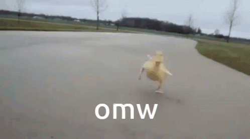 A Yellow Duck Is Running Down A Road With The Word Omw Written On The Bottom GIF
