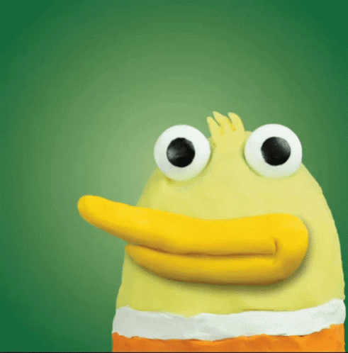 A Yellow Duck With Big White Eyes And A Yellow Beak On A Green Background GIF