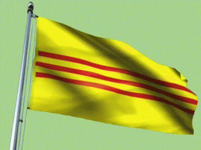 A Yellow Flag With Red Stripes On It Is Flying In The Wind GIF