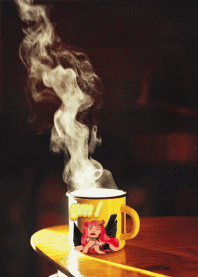A Yellow Mug With A Picture Of A Girl And The Word Gm On It GIF