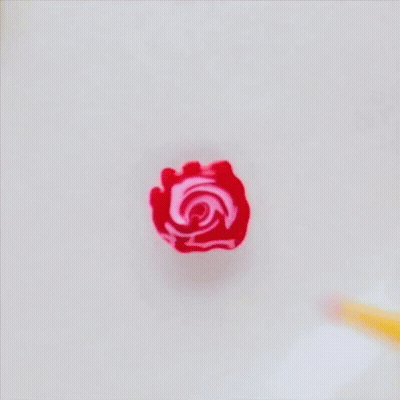 A Yellow Pencil Has A Red Rose On It GIF