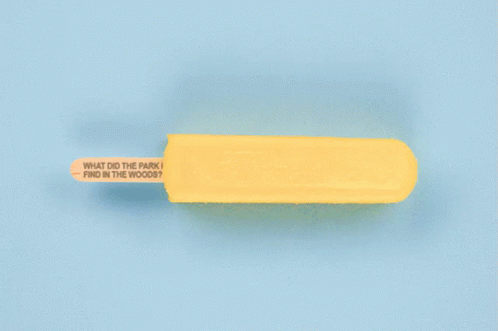 A Yellow Popsicle With The Words " What Did The Park Find In The Woods " Written On It GIF