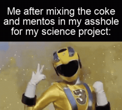A Yellow Power Ranger Is Giving A Thumbs Up Sign While Wearing A Helmet And Gloves . GIF