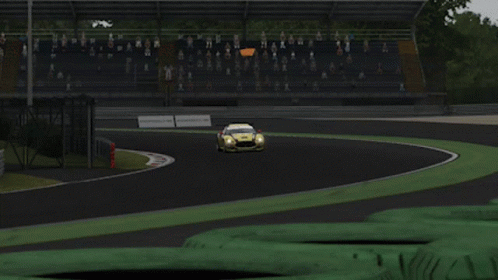 A Yellow Race Car With The Number 55 On The Back GIF