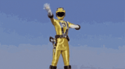 A Yellow Ranger With The Number 3 On His Chest GIF