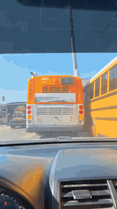 A Yellow School Bus With The Number 3853 On The Back GIF