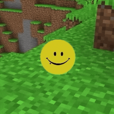 A Yellow Smiley Face Is Standing In The Grass GIF