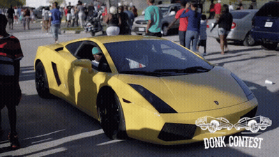A Yellow Sports Car Is Parked In A Parking Lot With A Donk Contest Logo GIF