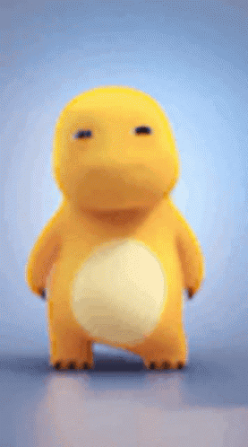 A Yellow Stuffed Animal With Its Arms Outstretched Is Standing On A Blue Surface GIF
