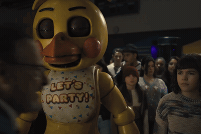 A Yellow Stuffed Animal With The Words Let 'S Party On Its Chest GIF