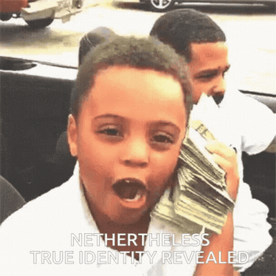 A Young Boy Holding A Stack Of Money With The Words Nethertheless True Identity Revealed Above Him GIF