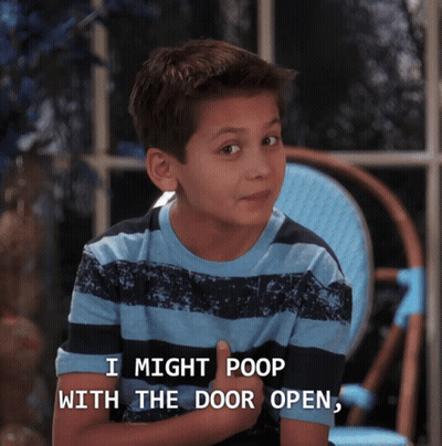 A Young Boy In A Blue And Black Striped Shirt Says I Might Poop With The Door Open GIF