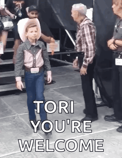 A Young Boy In A Cowboy Outfit Is Walking Towards A Man And Says Tori You 'Re Welcome GIF