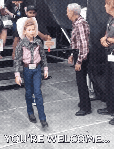 A Young Boy In A Cowboy Outfit Is Walking With The Words You 'Re Welcome Below Him GIF