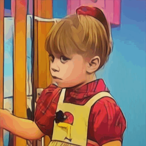 A Young Boy In A Red Shirt And Yellow Apron Is Standing In Front Of A Door GIF