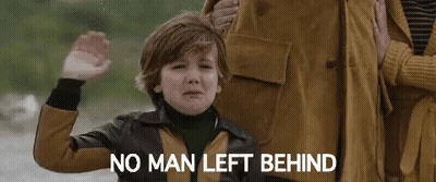 A Young Boy Is Crying While Standing Next To A Woman And Waving . GIF