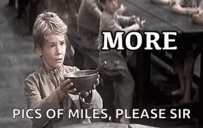A Young Boy Is Holding A Bowl Of Food And Asking For More Pics Of Miles . GIF
