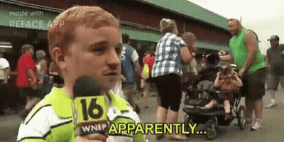 A Young Boy Is Holding A Microphone In Front Of A Crowd Of People And Says `` Apparently '' . GIF