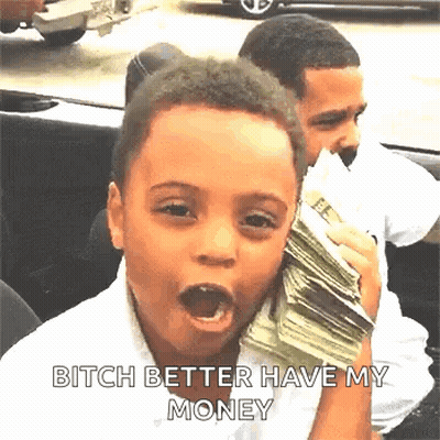 A Young Boy Is Holding A Stack Of Money In His Mouth And Making A Funny Face . GIF