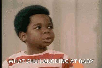 Boy Laughing At Baby In Red And White Striped Shirt GIF