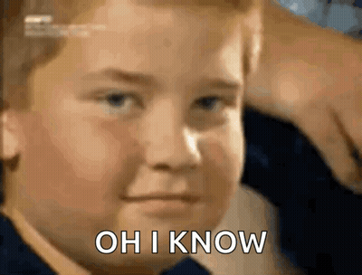 A Young Boy Is Making A Funny Face And Says Oh I Know GIF