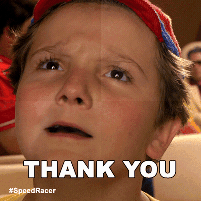 A Young Boy Is Making A Thank You Sign GIF