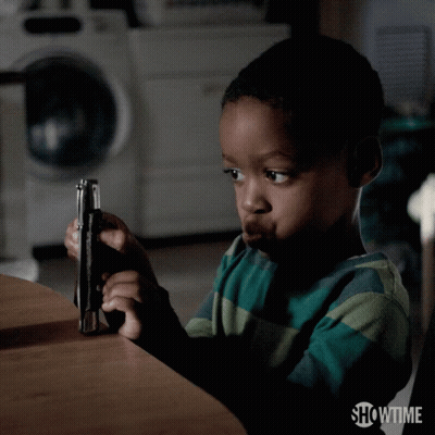 A Young Boy Is Playing With A Knife And The Showtime Logo Is Visible GIF
