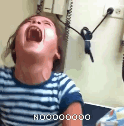 A Young Boy Is Screaming With His Mouth Wide Open And The Word Nooo On The Bottom Right GIF