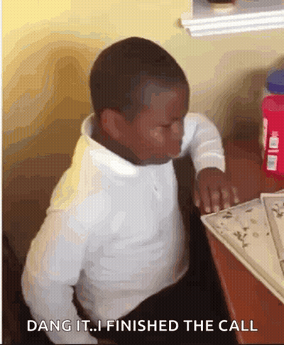 A Young Boy Is Sitting At A Desk With A Bottle Of Water In The Background And Says Dang It ... I Finished The Call GIF