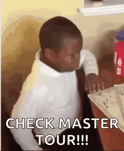 A Young Boy Is Sitting At A Table With A Book And A Bottle Of Water . GIF