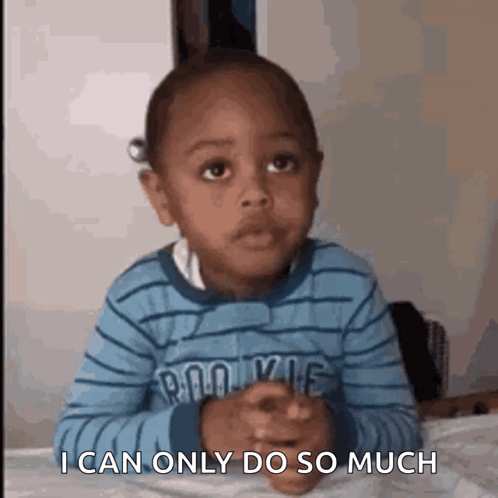 A Young Boy Is Sitting At A Table With His Hands Folded And Says I Can Only Do So Much GIF