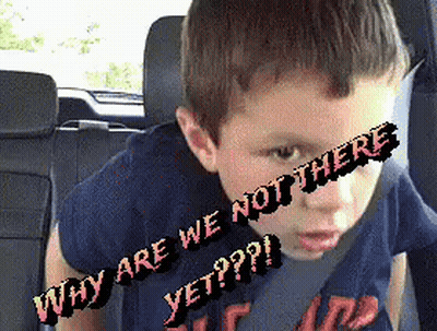 A Young Boy Is Sitting In The Back Seat Of A Car With Why Are We Not There Yet Written On His Face GIF