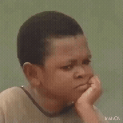 A Young Boy Is Sitting On A Cooler With His Hands Folded . GIF