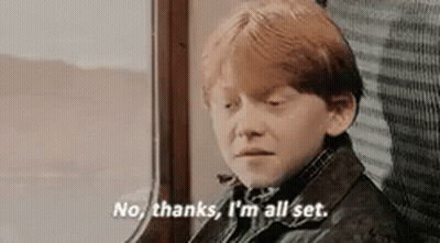 A Young Boy Is Sitting On A Train And Saying No Thanks , I 'M All Set . GIF
