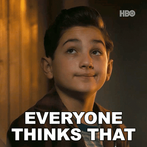 A Young Boy Is Smiling With The Words Everyone Thinks That Below Him GIF