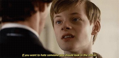 A Young Boy Is Talking To A Man In A Suit And Says `` If You Want To Hate Someone You Should Look In The Mirror . GIF