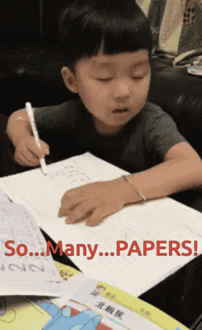 A Young Boy Is Writing On A Piece Of Paper With The Words So Many Papers Written On It GIF
