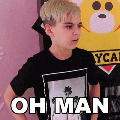 A Young Boy Wearing A Black T-Shirt With The Words Oh Man On It . GIF