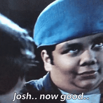 A Young Boy Wearing A Blue Hat Is Saying Josh Now Good . GIF