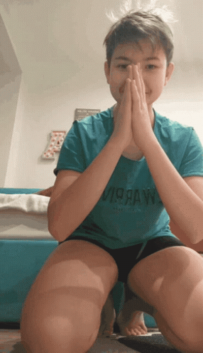 A Young Boy Wearing A Blue Shirt That Says Virraw On It GIF