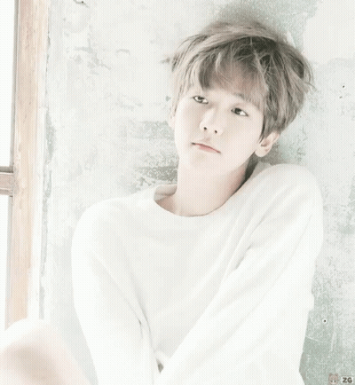 A Young Boy Wearing A White Sweater With The Number 26 On It GIF
